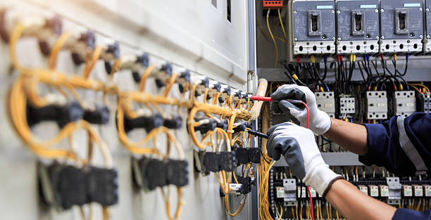 Professional Electrician technician working in South Chicago Heights, IL